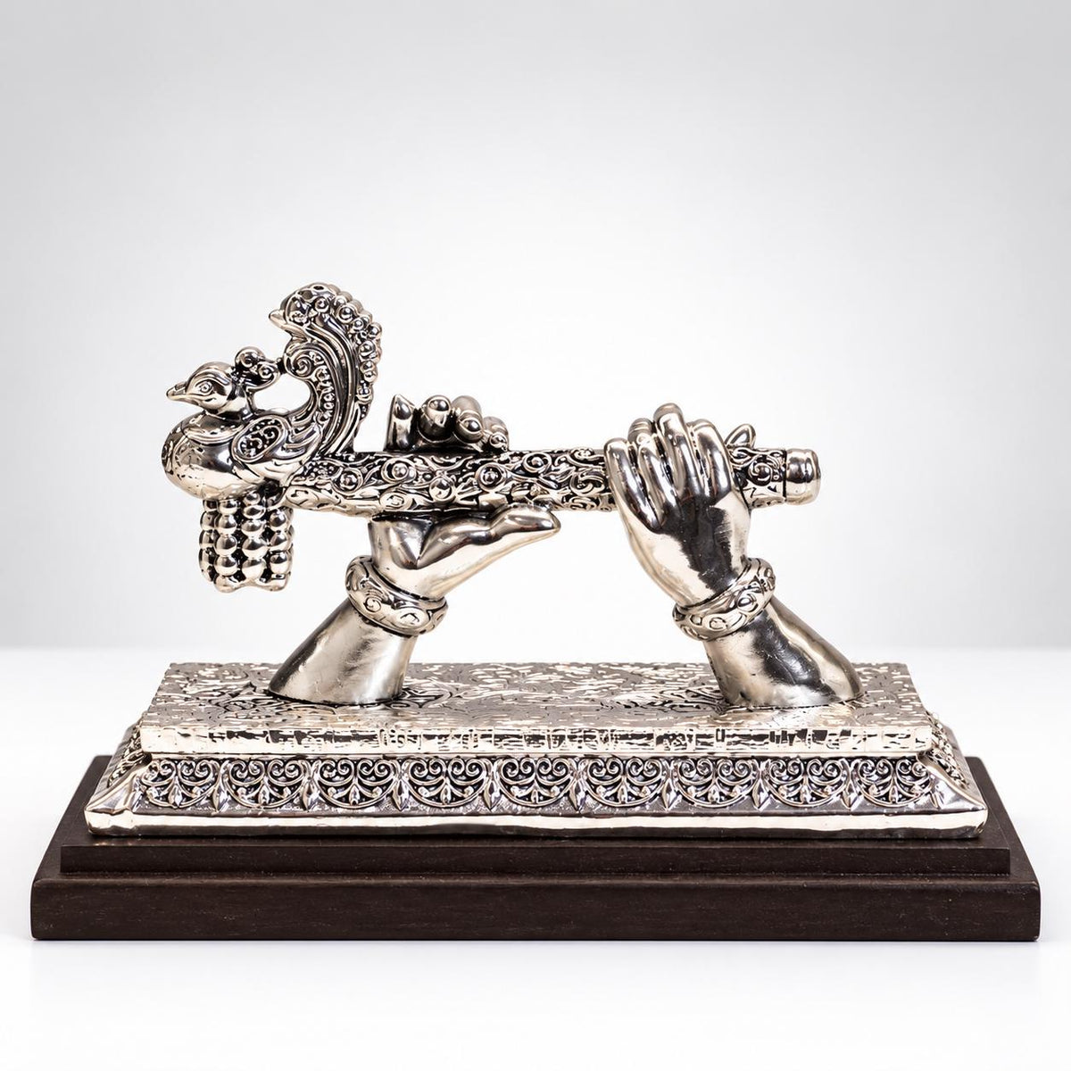 Silver Plated Krishna Hand & Flute Figurine, Peacock Motif, Wooden Base (5x7.5")